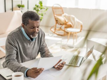 Man looking at utility bill